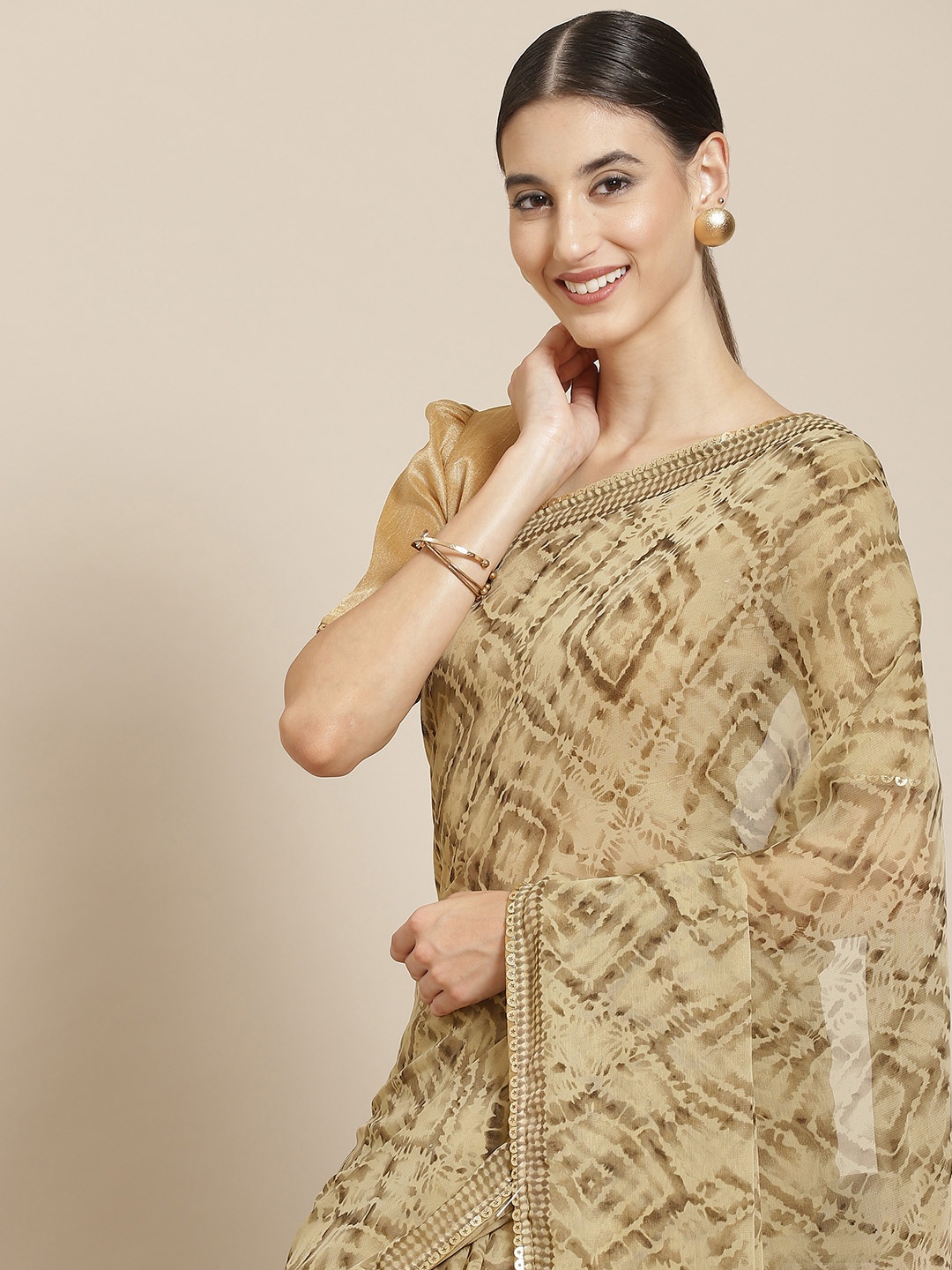 

Satrani Beige & Brown Printed Saree