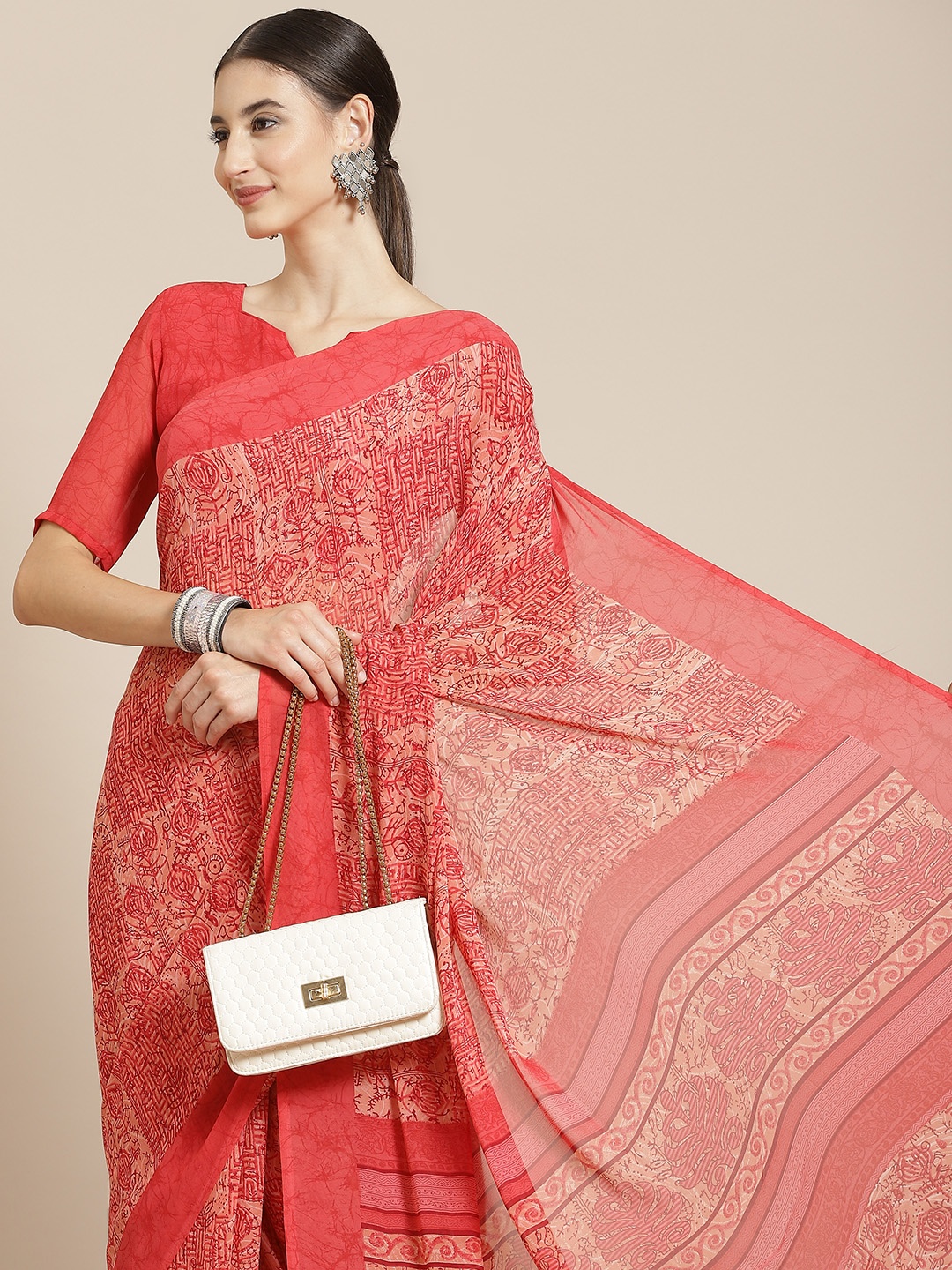 

Satrani Peach-Coloured Printed Saree