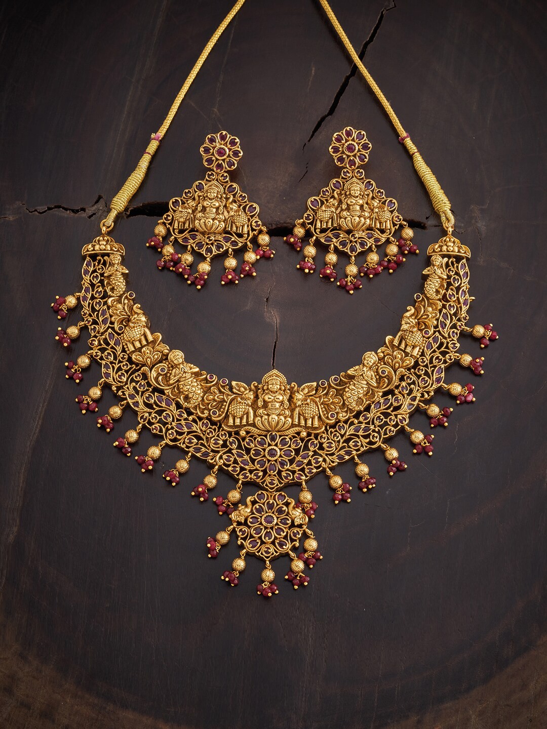 

Kushal's Fashion Jewellery Gold-Toned & Maroon Gold-Plated Antique Jewellery Set