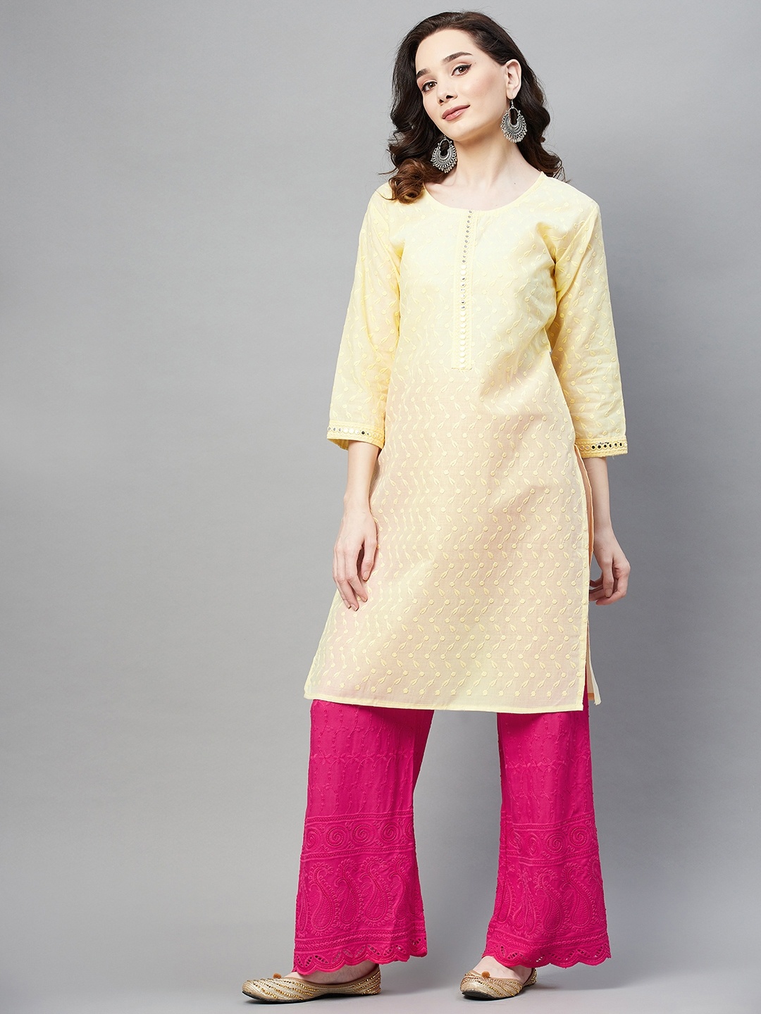 

Aarika Women Yellow Geometric Embroidered Mirror Work Kurta