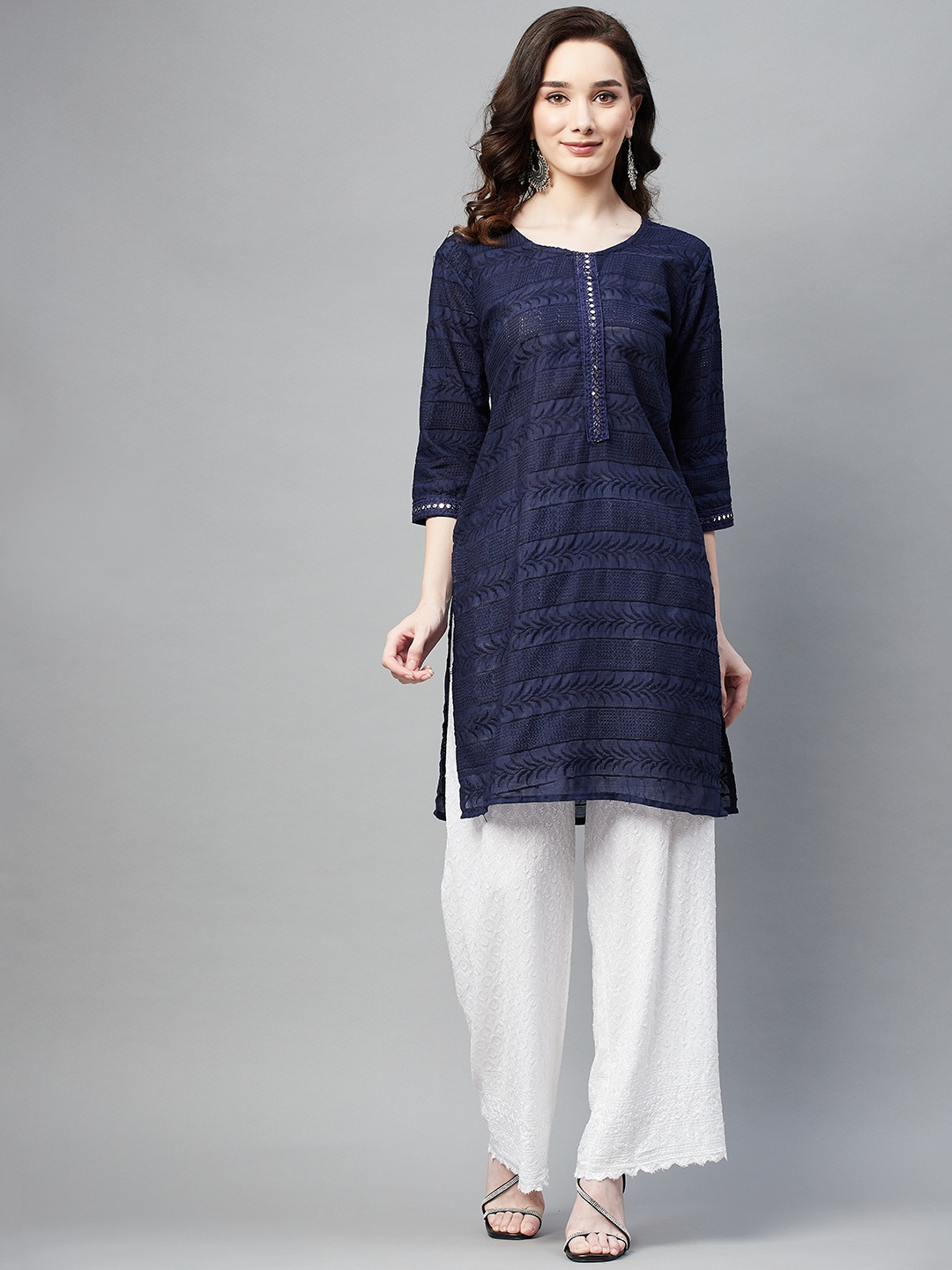 

Aarika Women Navy Blue Ethnic Motifs Embroidered Kurta