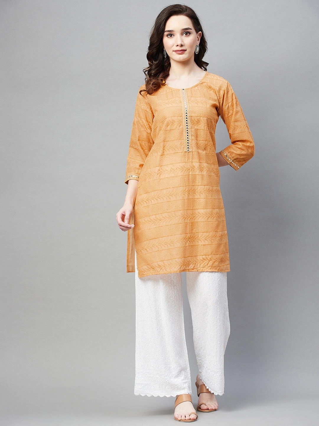 

Aarika Women Camel Brown Embroidered Mirror Work Cotton Kurta