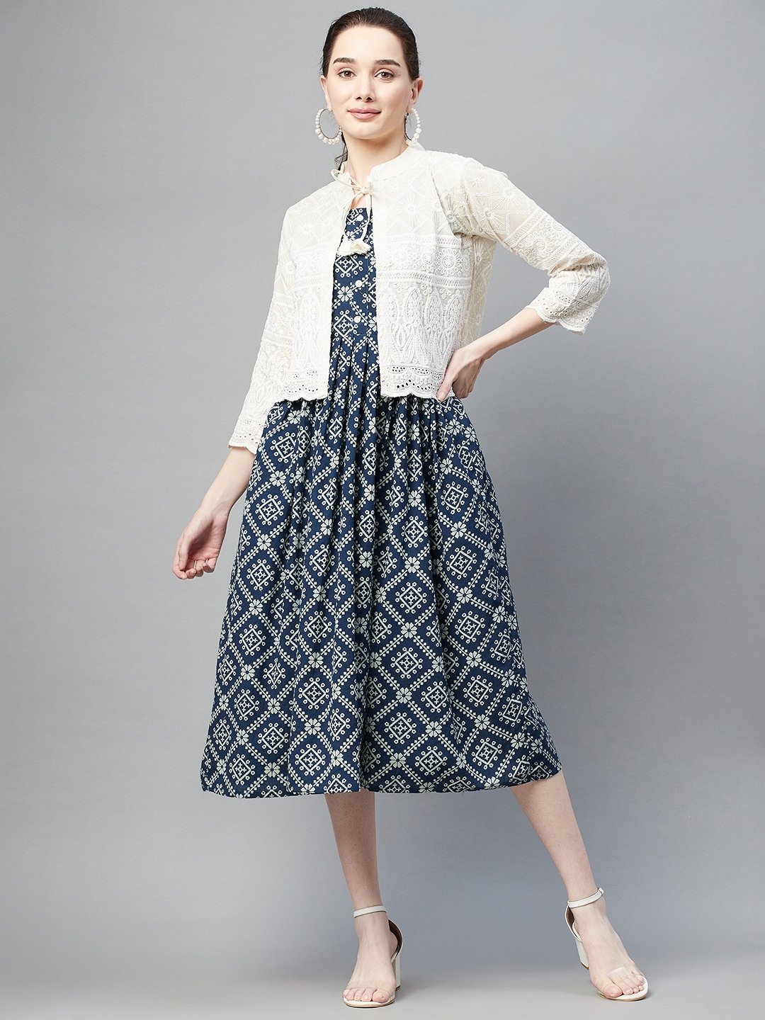 

Aarika Women Blue & Off-White Pure Cotton Geometric Print Fit & Flare Dress with Shrug