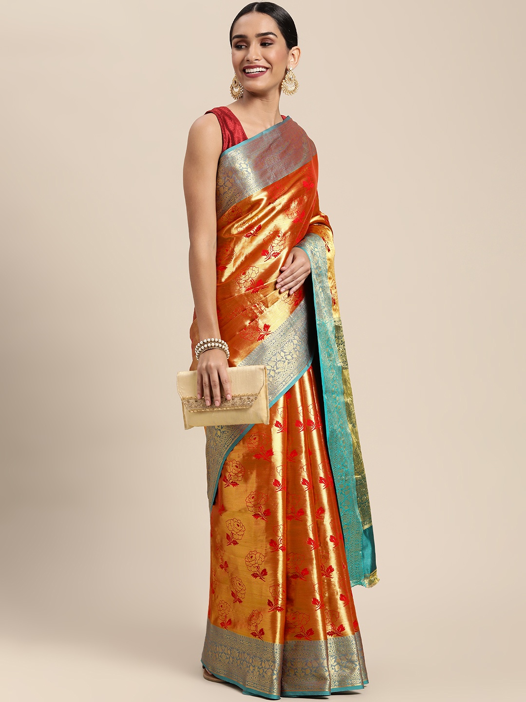 

Mitera Red & Golden Floral Zari Silk Blend Banarasi Saree