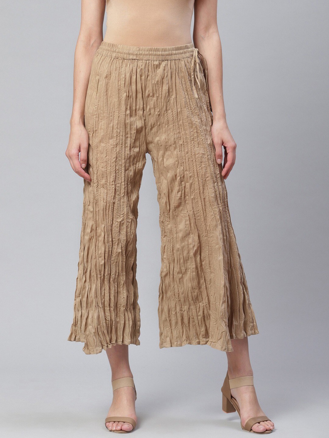 

KSUT Women Beige Flared Ethnic Cotton Palazzos