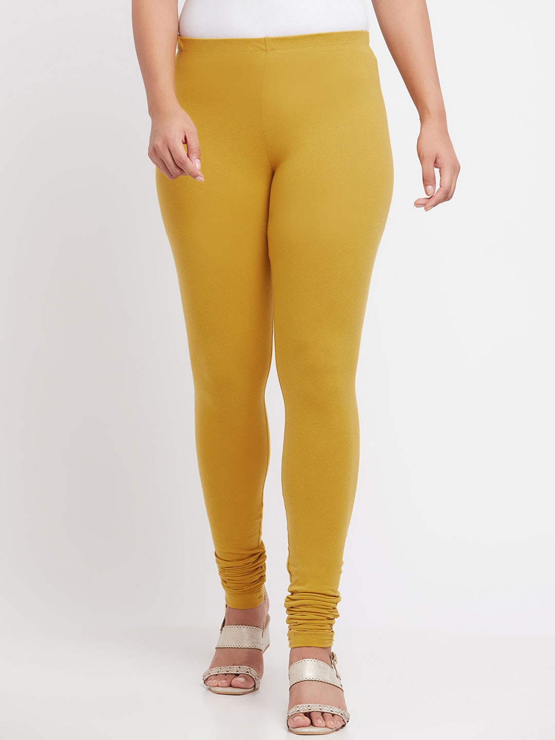 

elleven Women Solid Cotton Churidar Leggings, Mustard