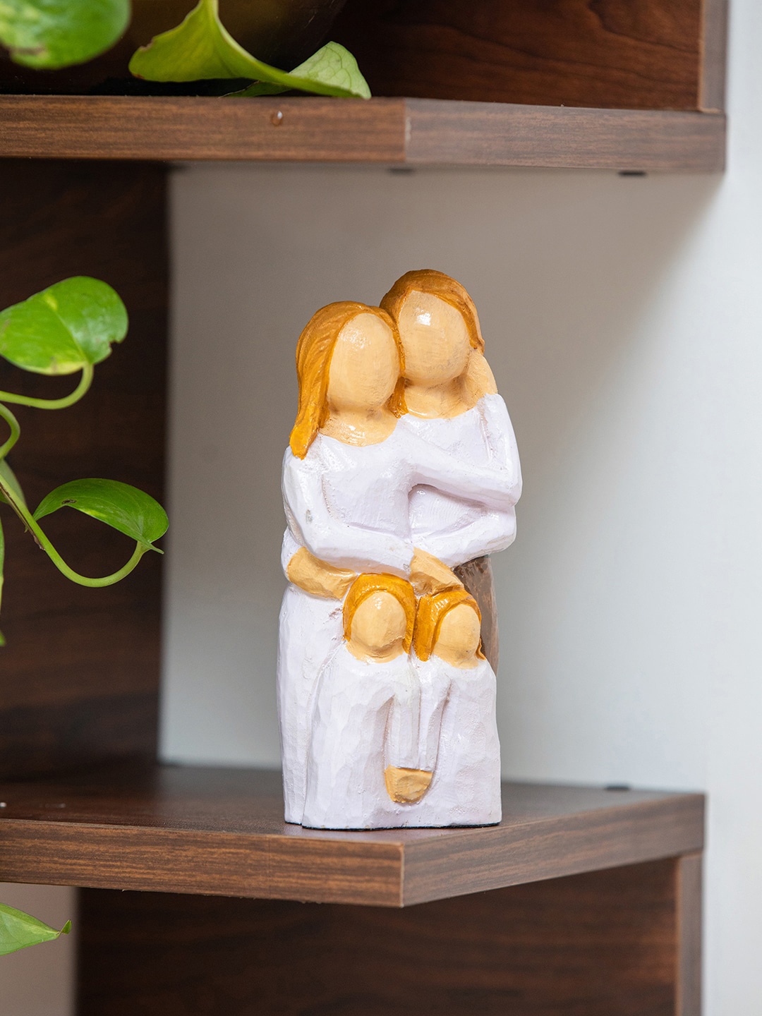 

ExclusiveLane White & Brown Familyhood Memories Wooden Figurine Showpieces