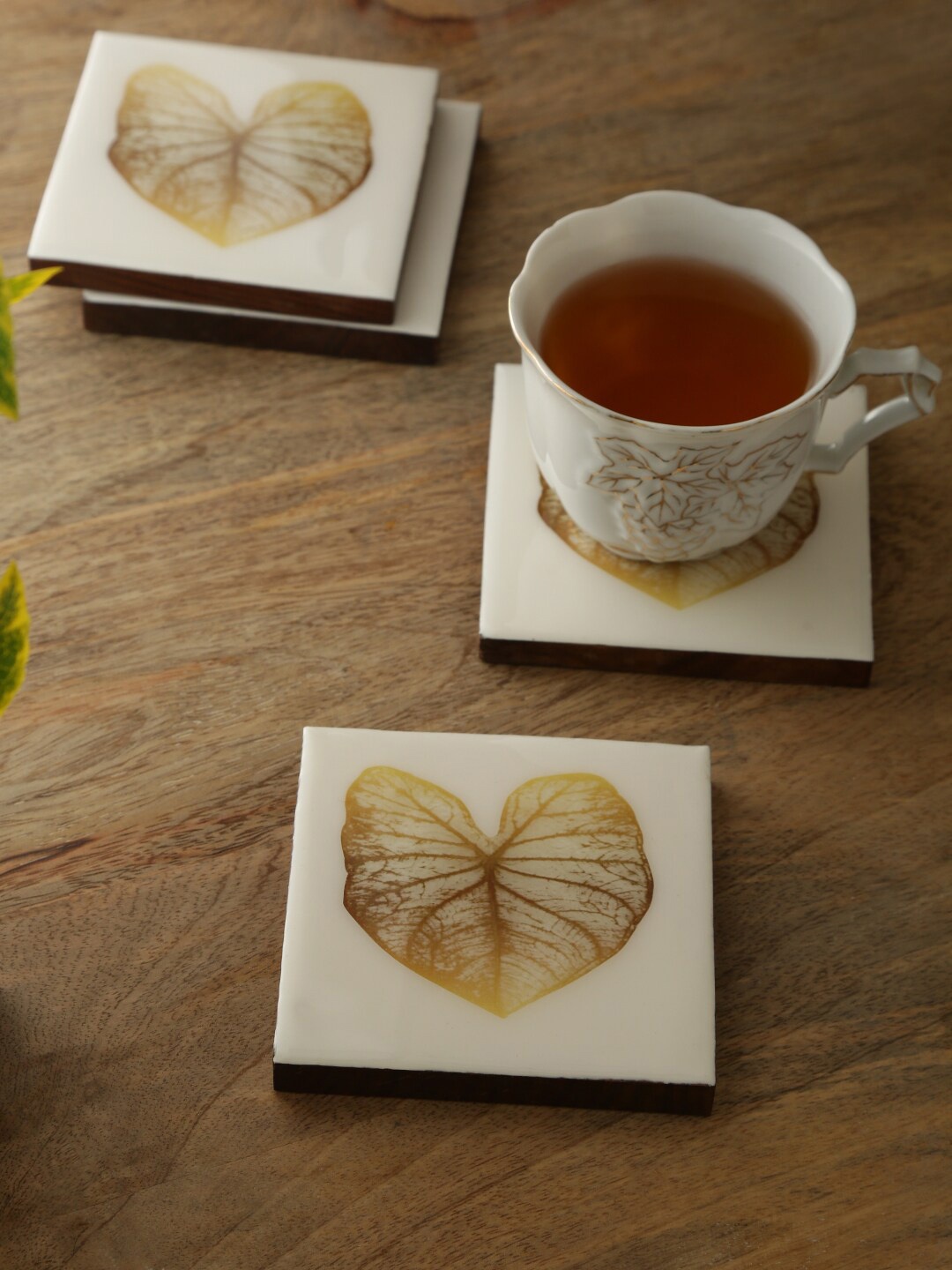 

Amoliconcepts Set of 4 Off White Leaf Printed Wooden Coasters