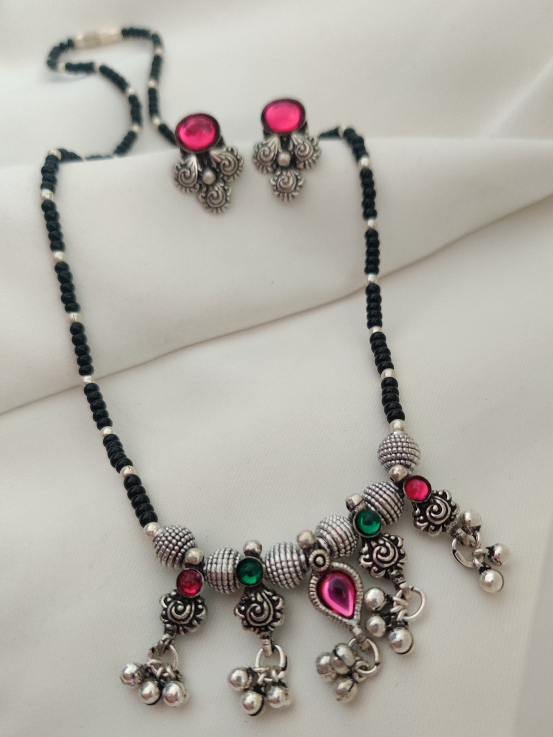 

Binnis Wardrobe Silver-Plated Black Stone-Studded & Beaded Mangalsutra With Earrings