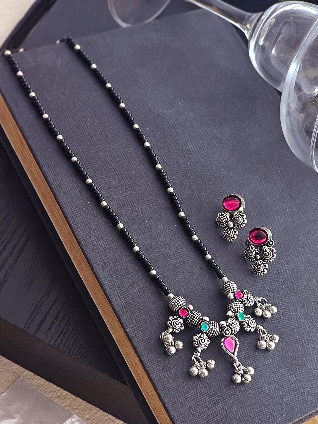 

Binnis Wardrobe Silver-Plated Black Stone-Studded & Beaded Mangalsutra With Earrings