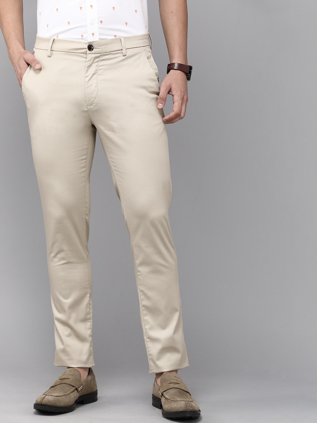 

Arrow Sport Men Beige Skinny Fit Low-Rise Trousers