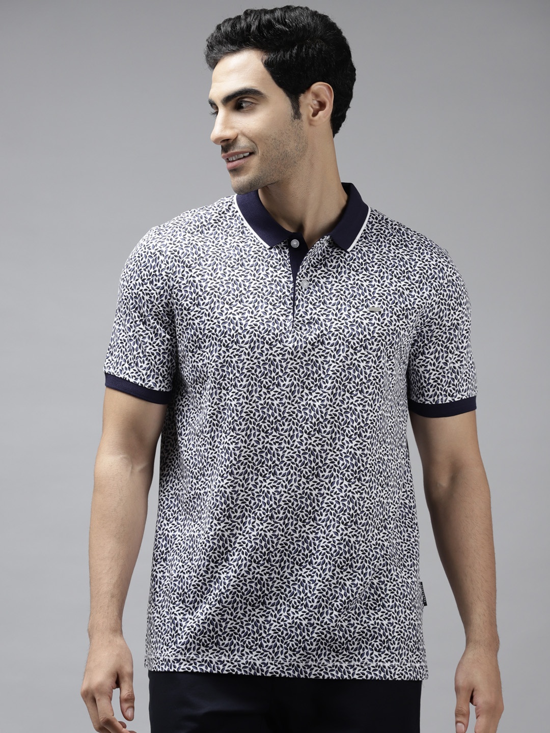 

Van Heusen Men Navy Blue & White Leaf Printed Polo Collar Pure Cotton Slim Fit T-shirt