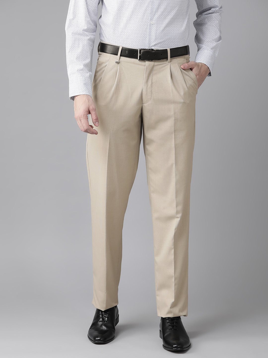 

Van Heusen Men Beige Self Design Pleated Trousers