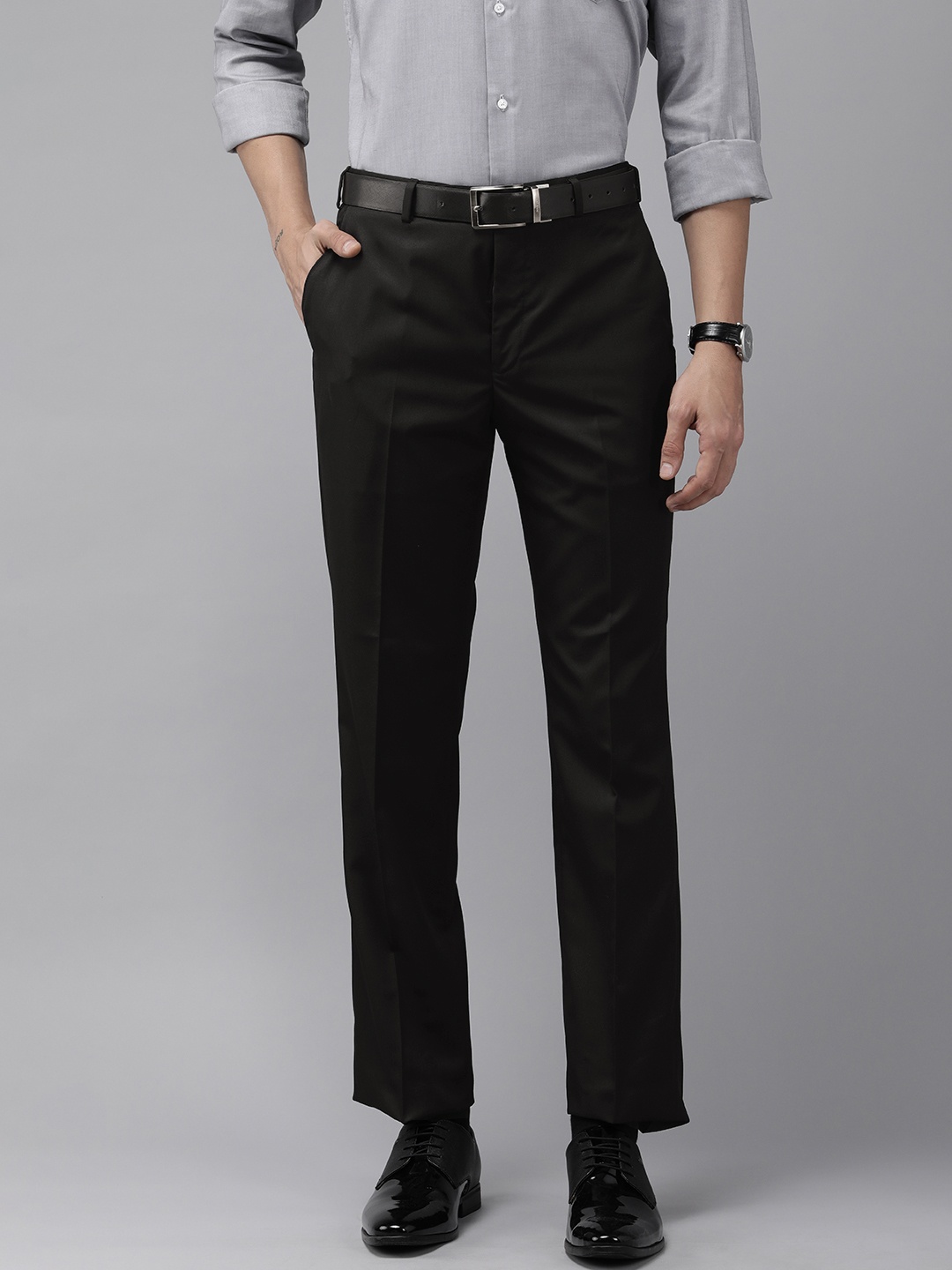 

Park Avenue Men Brown Solid Mid Rise Formal Trousers