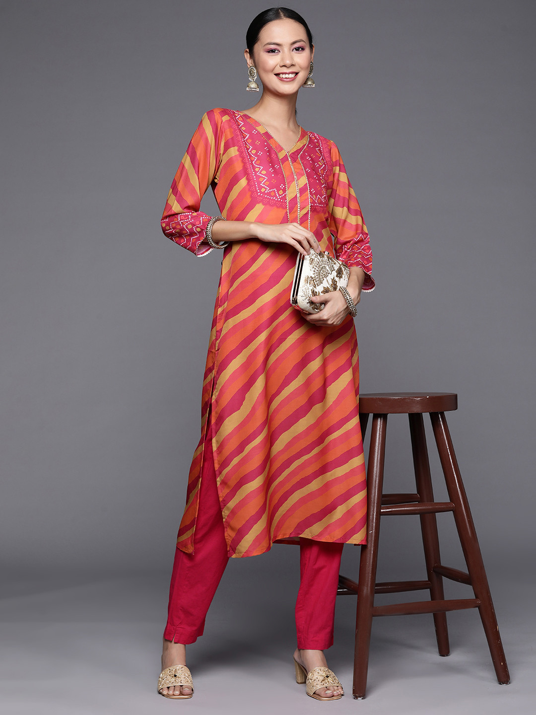 

Varanga Women Orange & Pink Striped Gotta Patti Kurta