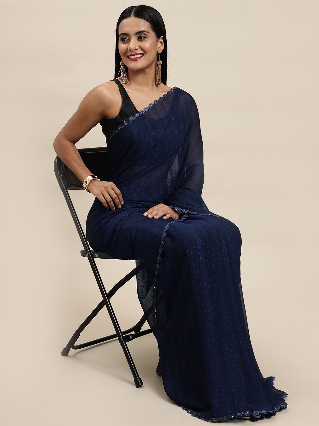 

Shaily Navy Blue Striped Beads and Stones Pure Chiffon Saree