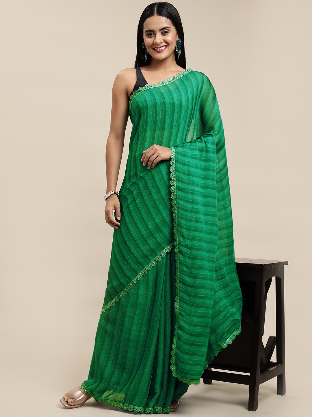 

Shaily Sea Green Striped Beads and Stones Pure Chiffon Saree