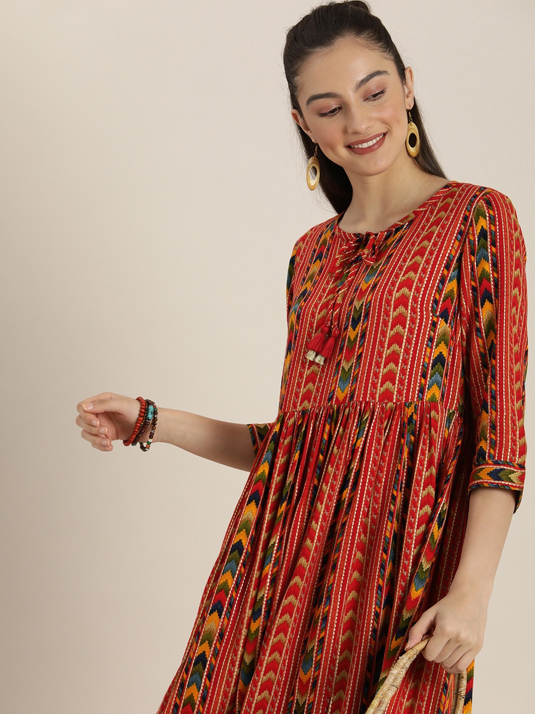 

Sangria Red & Beige Printed Tie-Up Neck Ethnic A-Line Dress