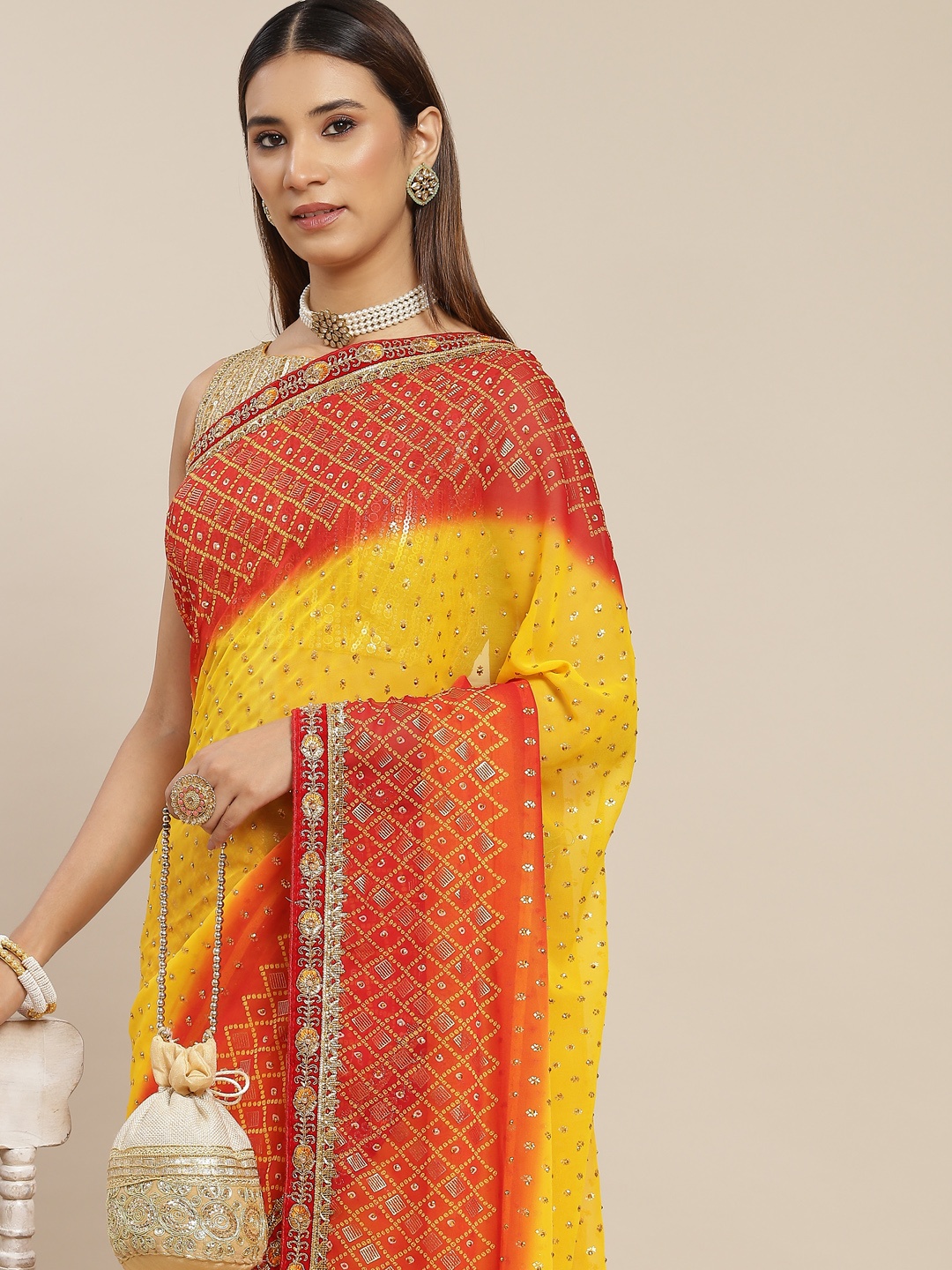 

Chhabra 555 Yellow & Red Embellished Sequinned Poly Georgette Saree