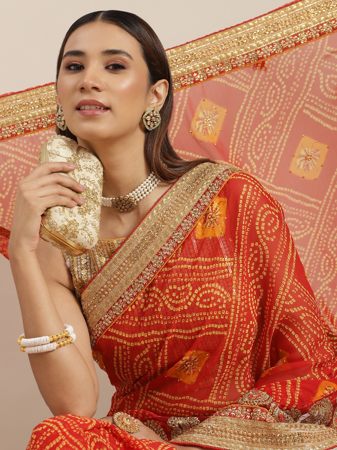 

Chhabra 555 Red & Maroon Bandhani Sequinned Heavy Work Poly Georgette Bandhani Saree