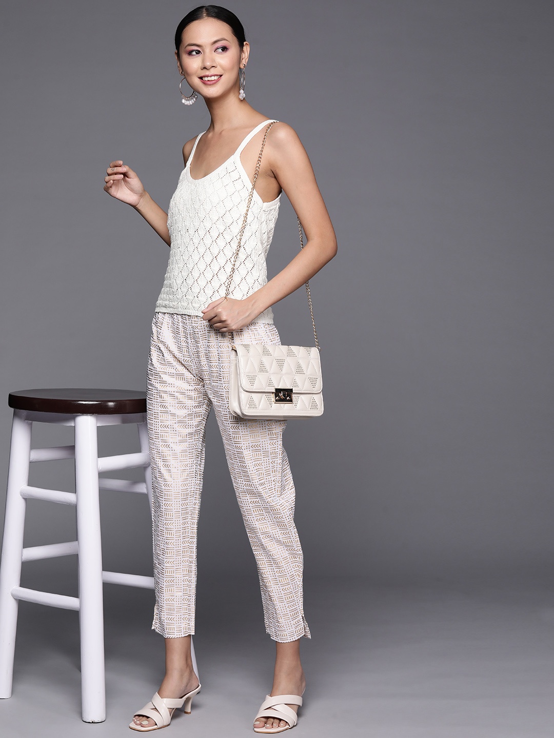 

Varanga Women Off White & Golden Ethnic Motifs Printed Trousers