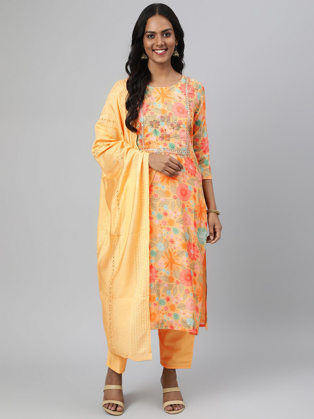 

Readiprint Fashions Women Orange Floral Printed Thread Work Kurta with Trousers & With Dupatta