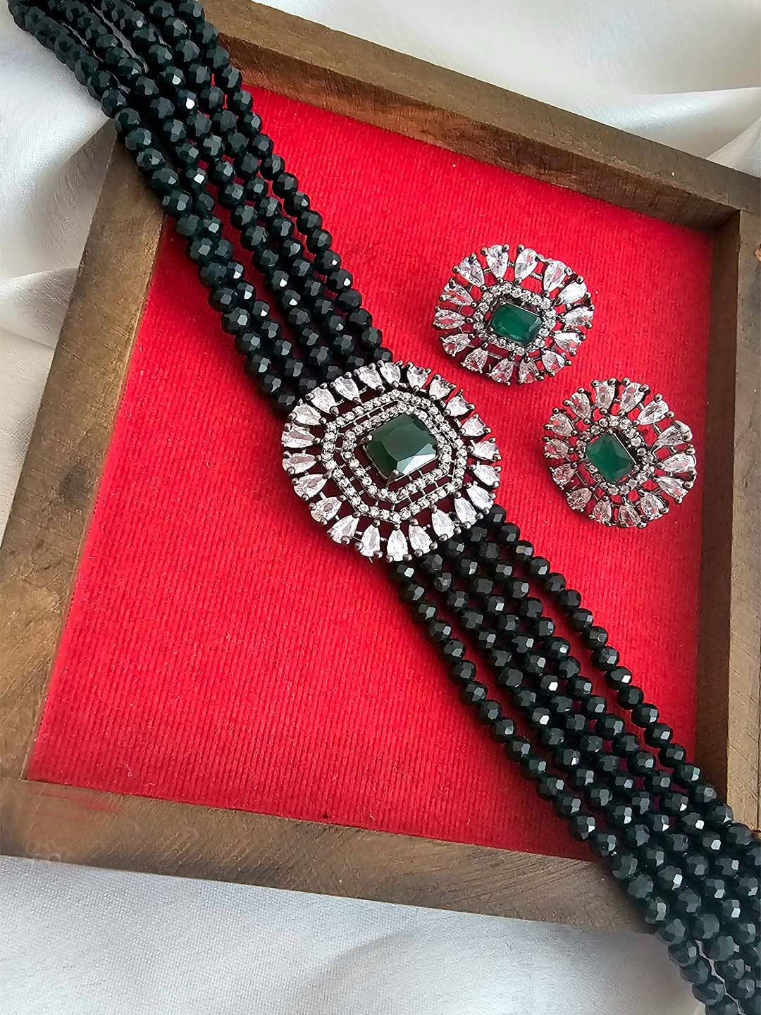 

Binnis Wardrobe Silver-Plated Green & White Kundan Studded Jewellery Set