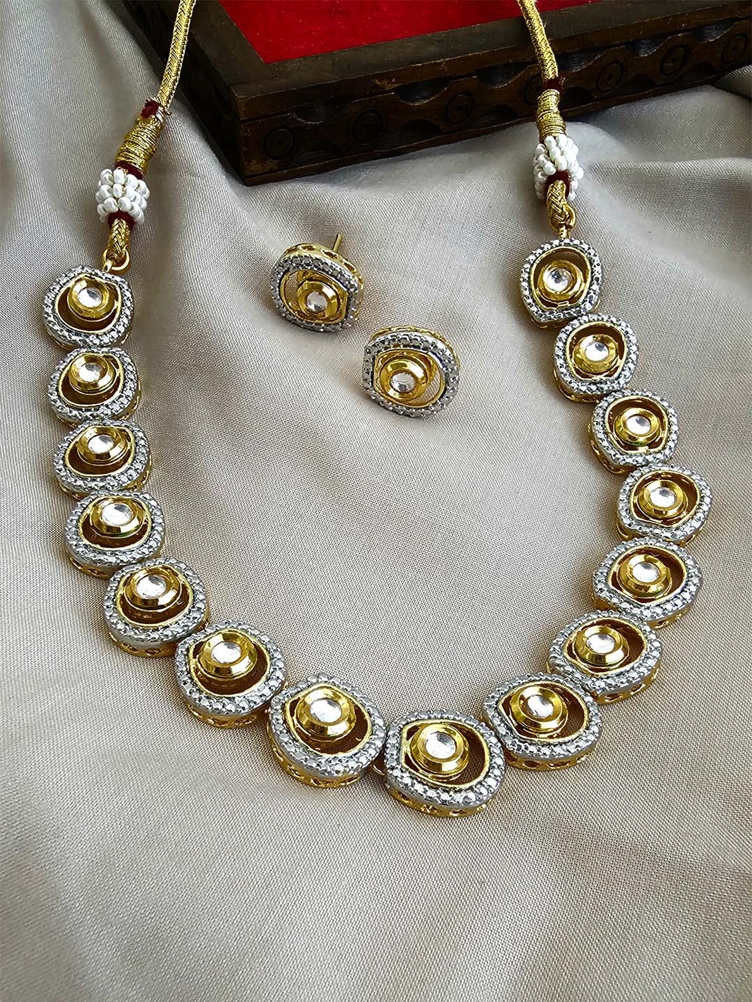 

Binnis Wardrobe Gold-Plated White Stone Studded Jewellery Set