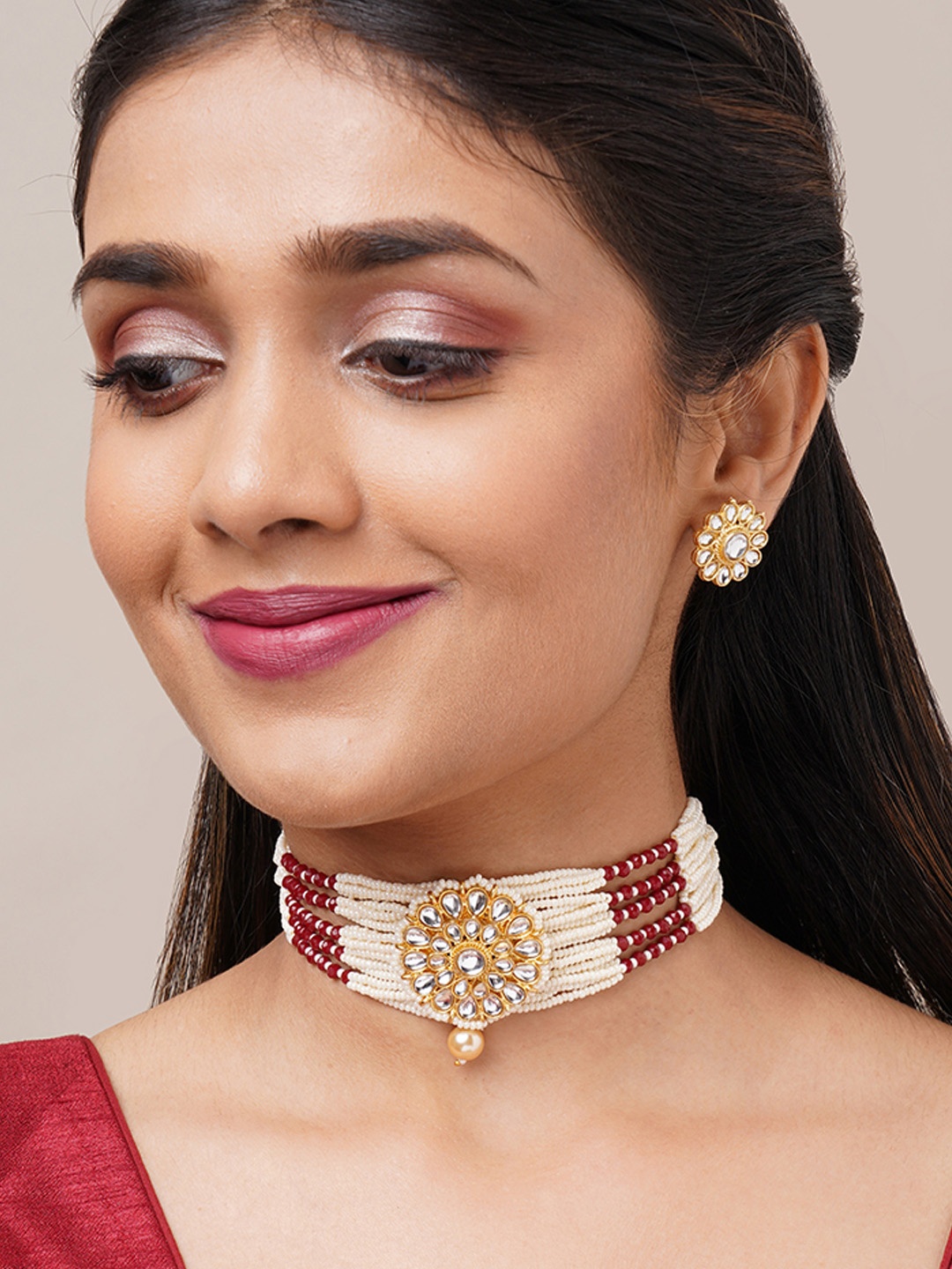 

Binnis Wardrobe Gold-Plated White & Red Kundan Studded Beaded Jewellery set