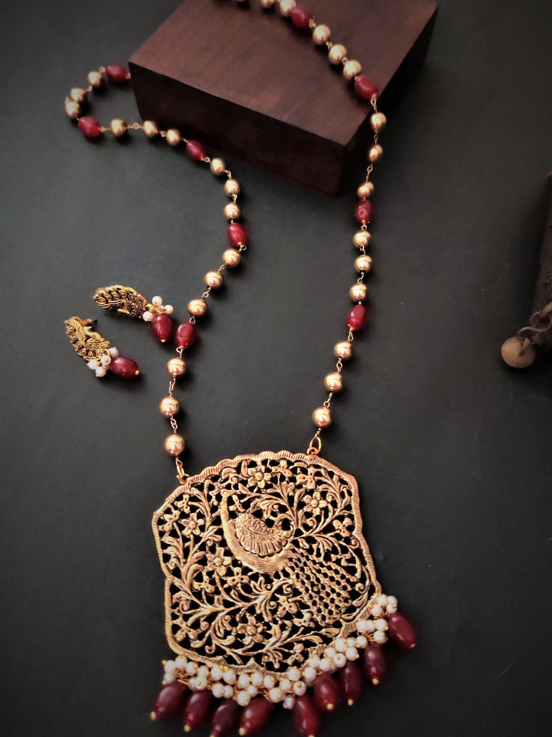 

Binnis Wardrobe Gold Plated & Red Stone Studded Jewellery Set