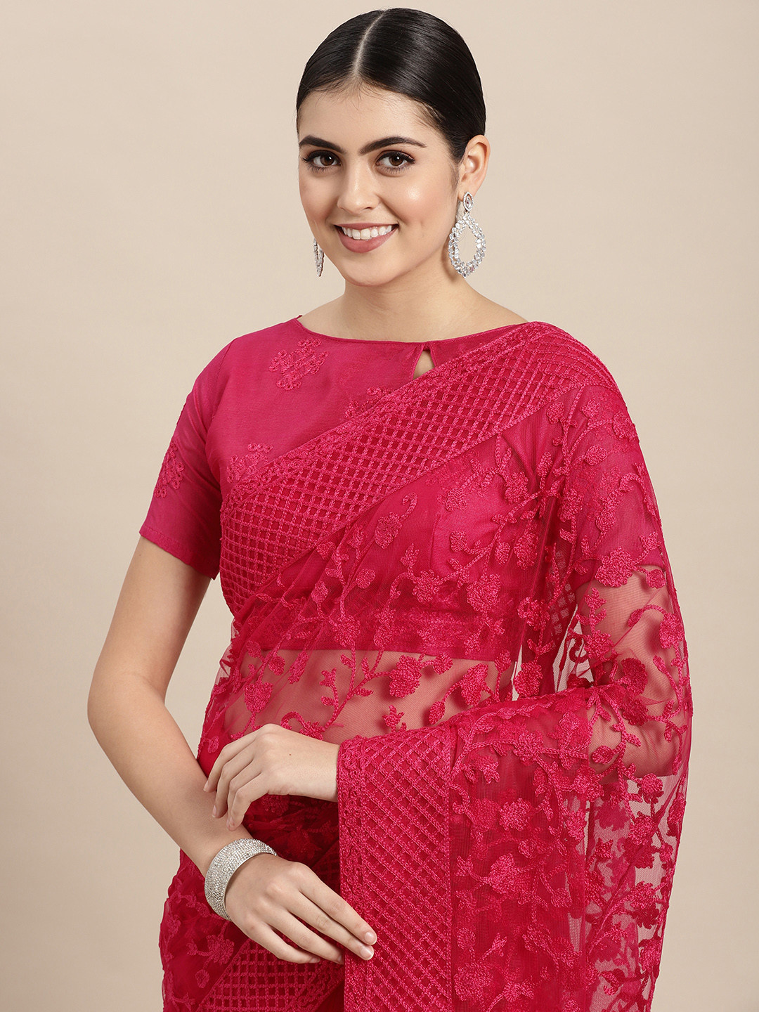 

VAIRAGEE Pink Floral Embroidered Net Saree