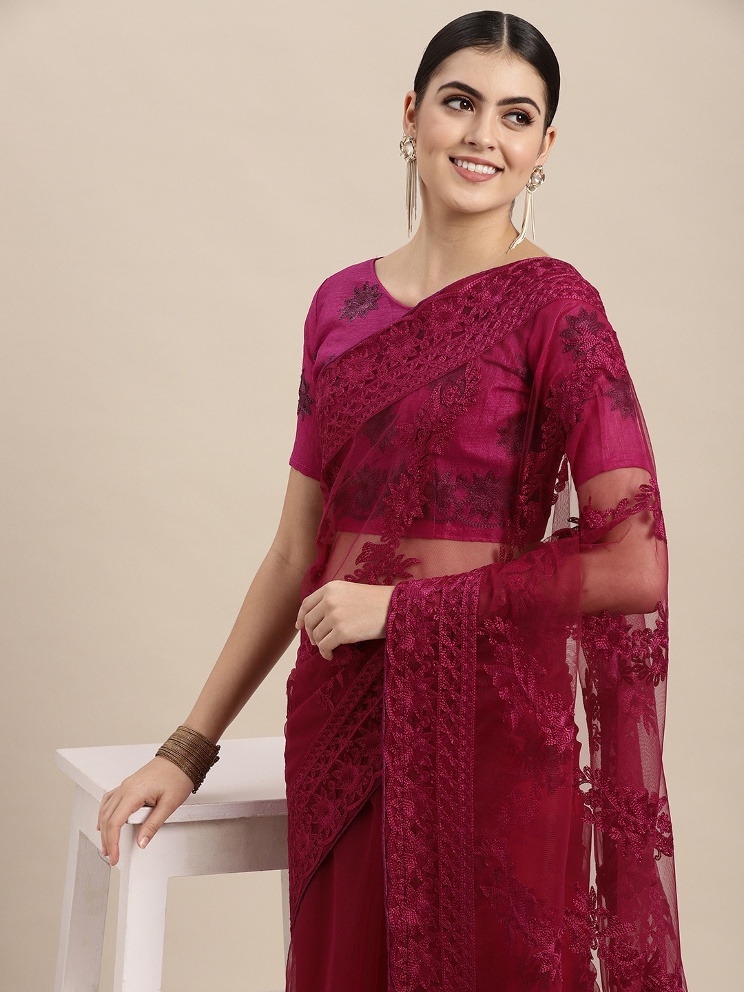 

VAIRAGEE Magenta Floral Embroidered Net Saree