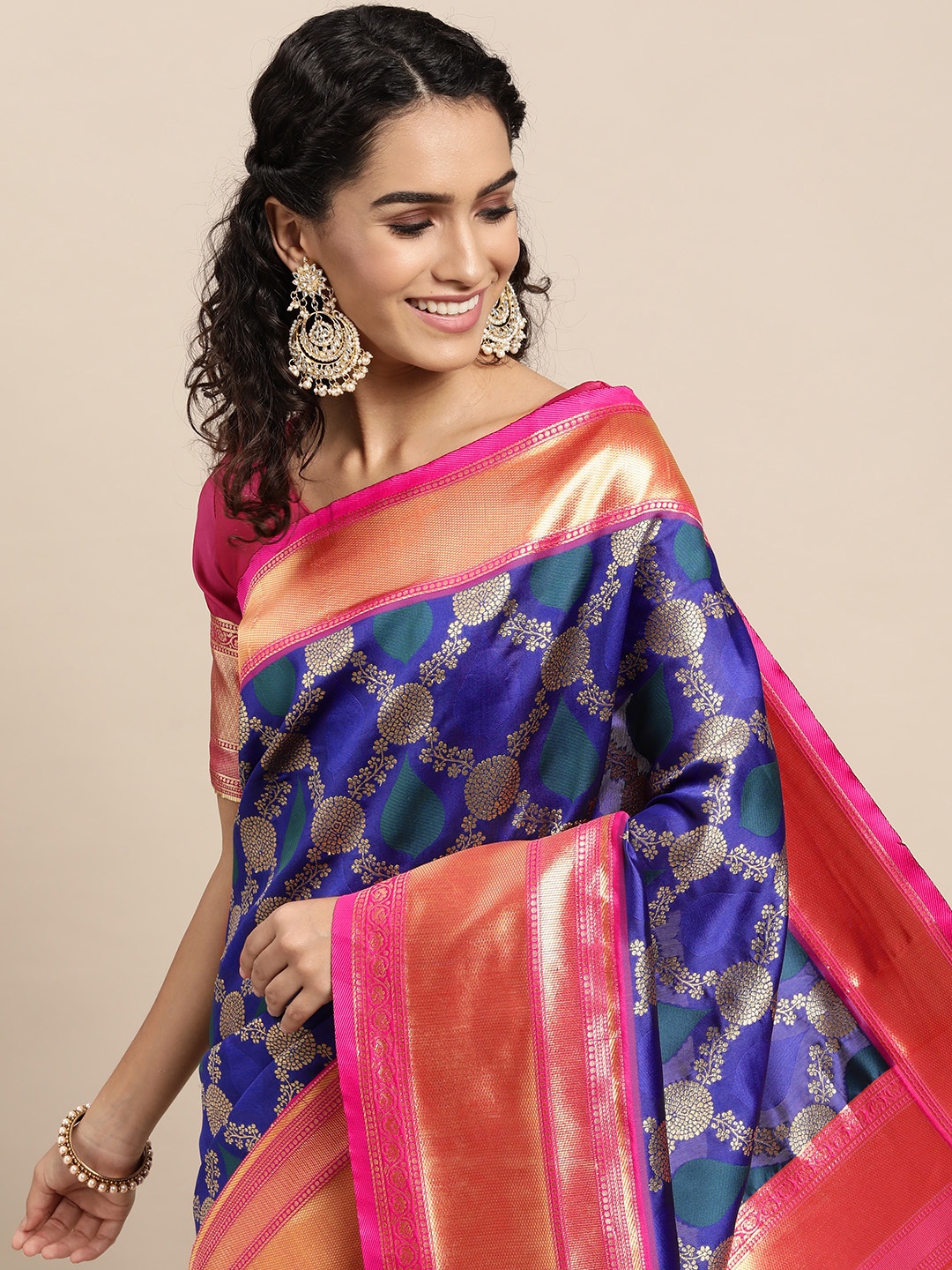 

VAIRAGEE Blue & Golden Ethnic Motifs Saree