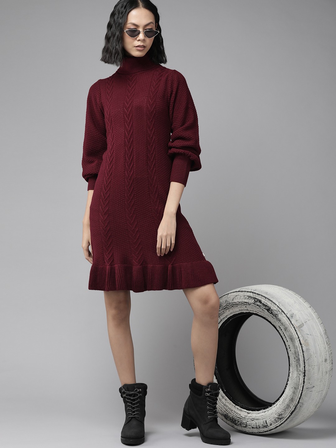 

The Roadster Lifestyle Co. Maroon Self Design High Neck Acrylic Jumper Dress