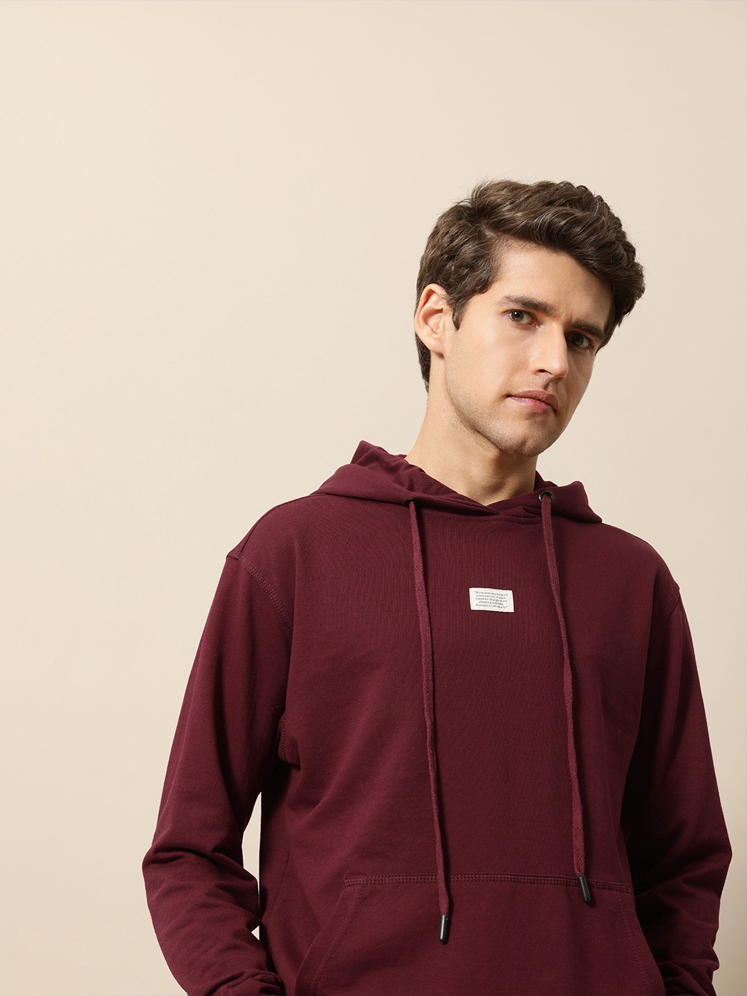 

Mr Bowerbird Men Maroon Solid Hooded Sweatshirt