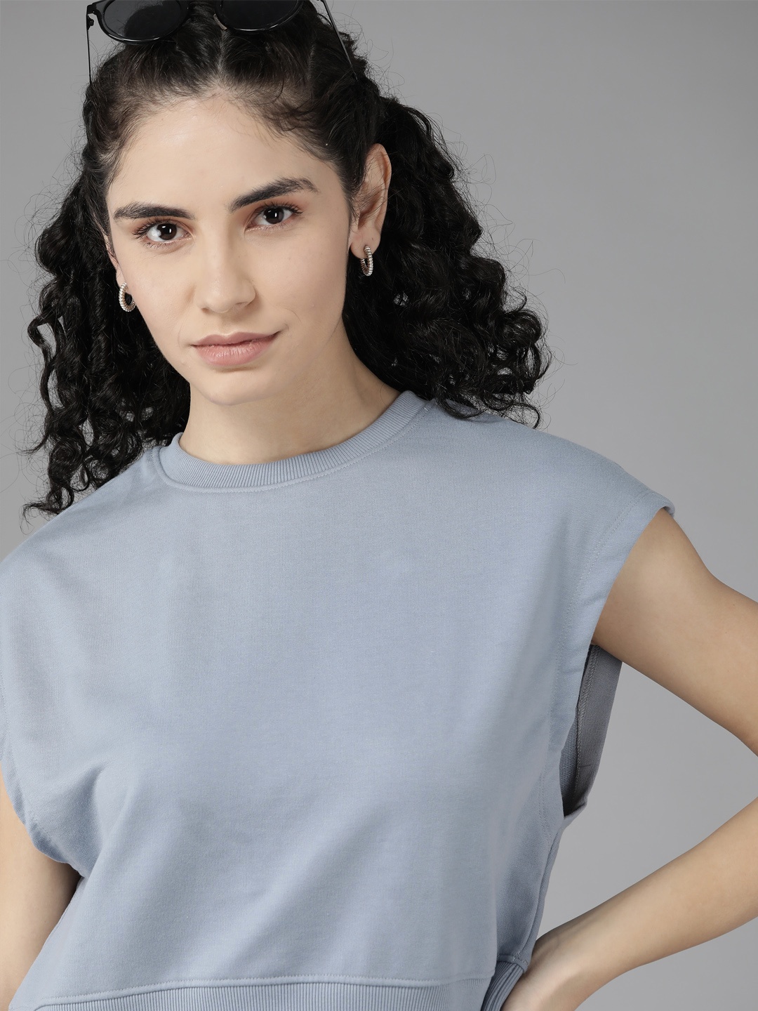 

Roadster Women Blue Solid Sweatshirt