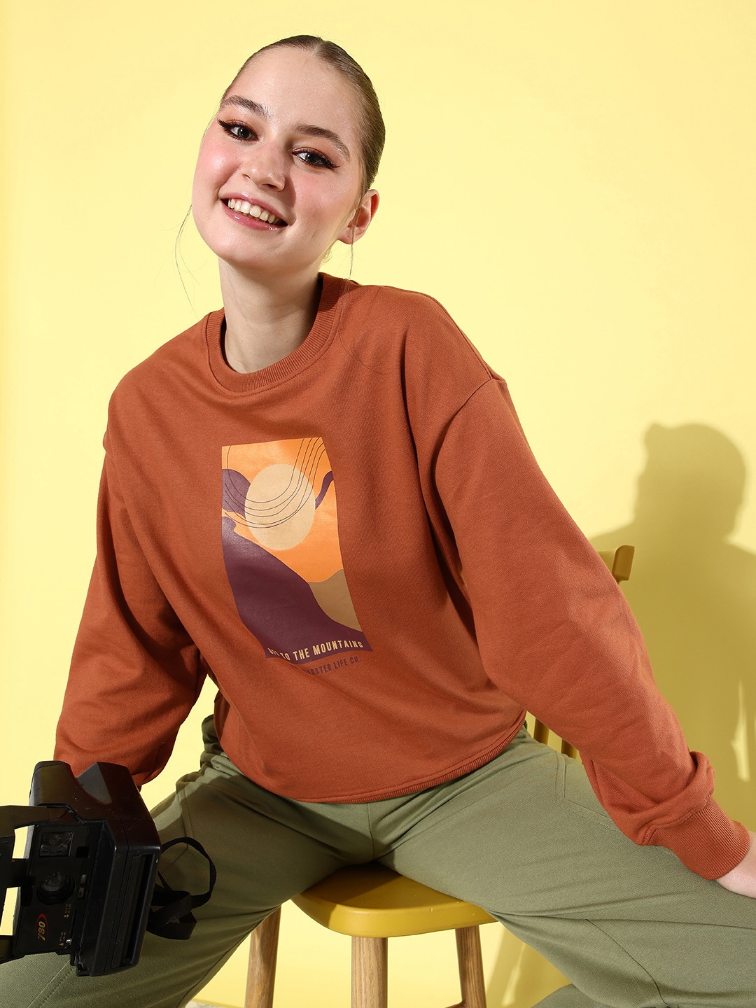 

The Roadster Life Co. Graphic Printed Hello Monsoon-Hyper Graphics Sweatshirt, Rust