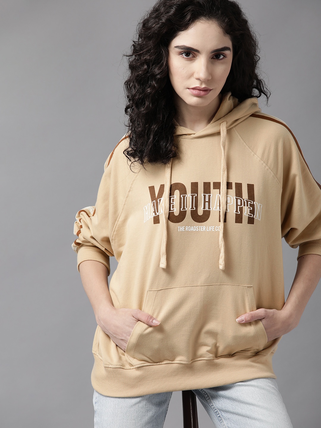 

Roadster Women Beige Printed Raglan Sleeves Hooded Sweatshirt