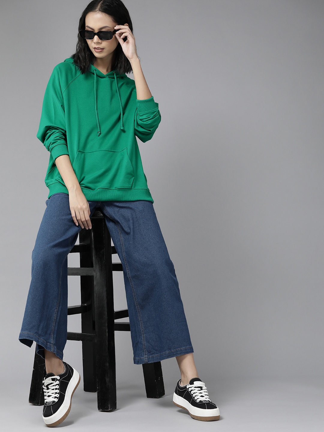 

Roadster Women Green Solid Hooded Sweatshirt