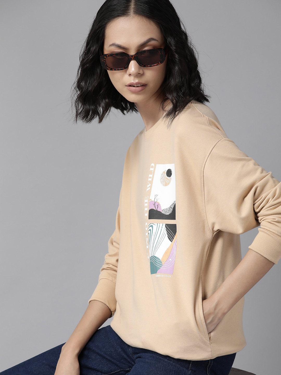 

The Roadster Lifestyle Co. Women Beige & White Printed Oversized Sweatshirt