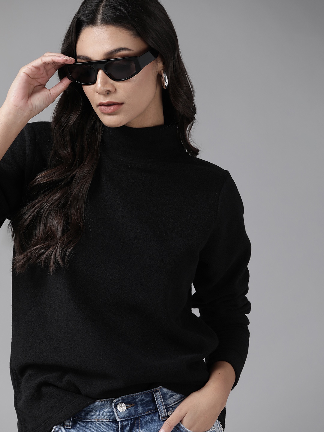 

Roadster Women Black Solid Fleece Sweatshirt