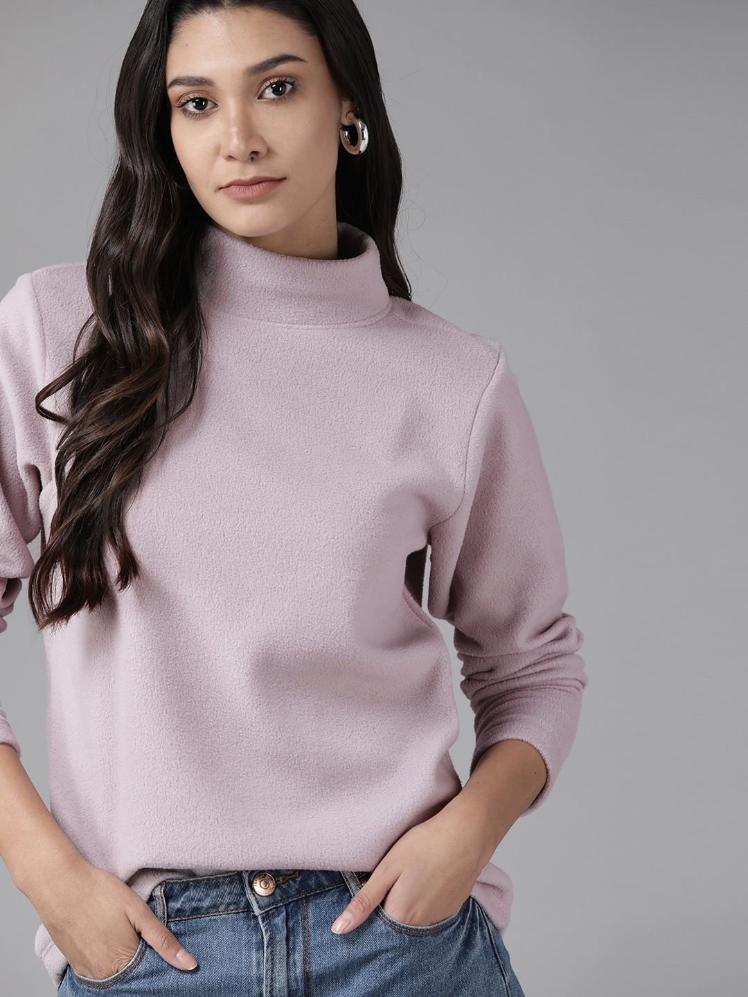 

Roadster Women Lavender Solid Fleece Sweatshirt