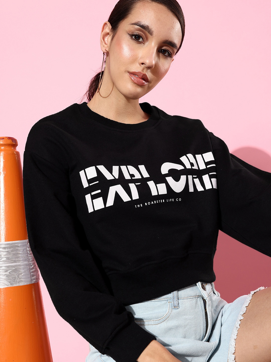 

The Roadster Life Co. Bold Black Typography Printed Crop Hyper Graphics Sweatshirt