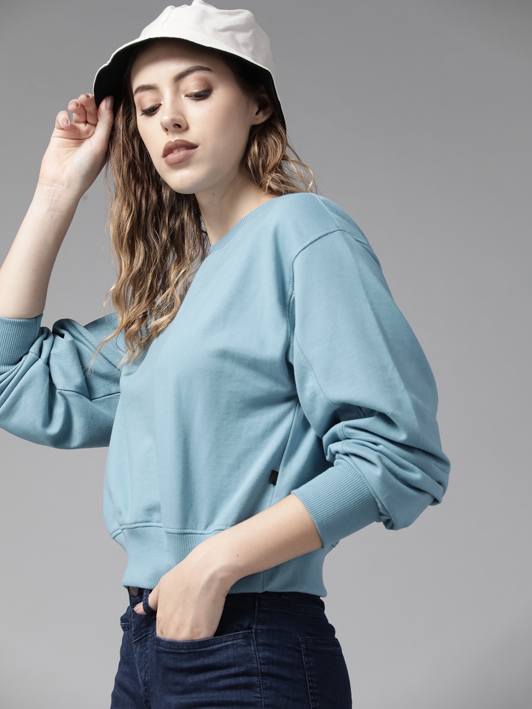 

Roadster Women Blue Solid Drop-Shoulder Sleeves Sweatshirt