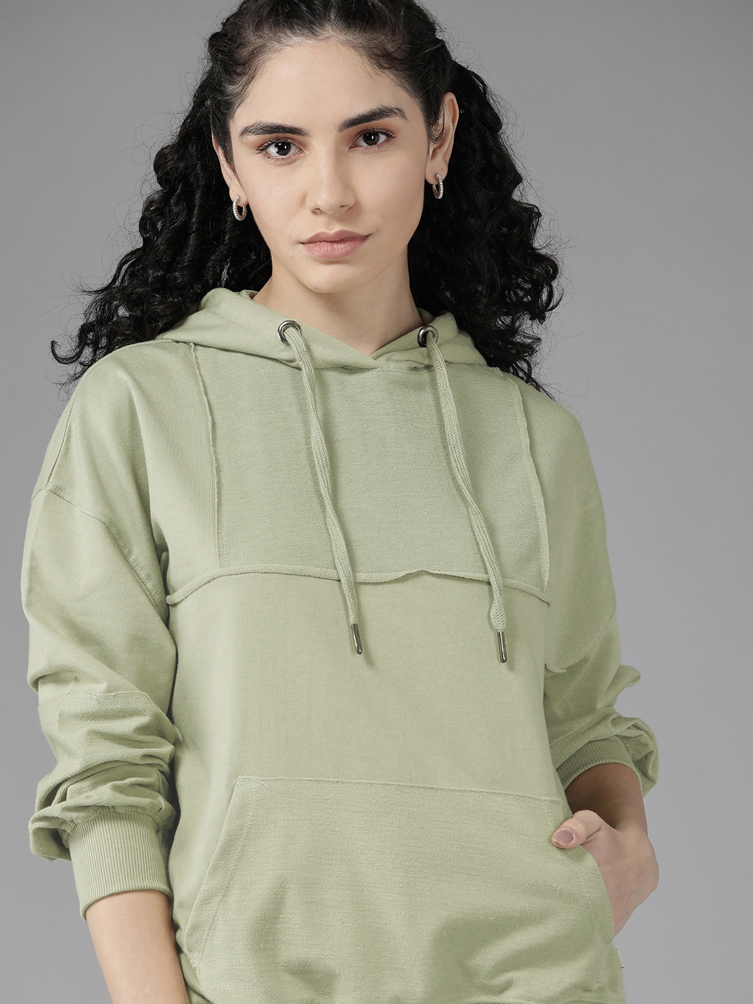 

Roadster Women Green Solid Hooded Sweatshirt