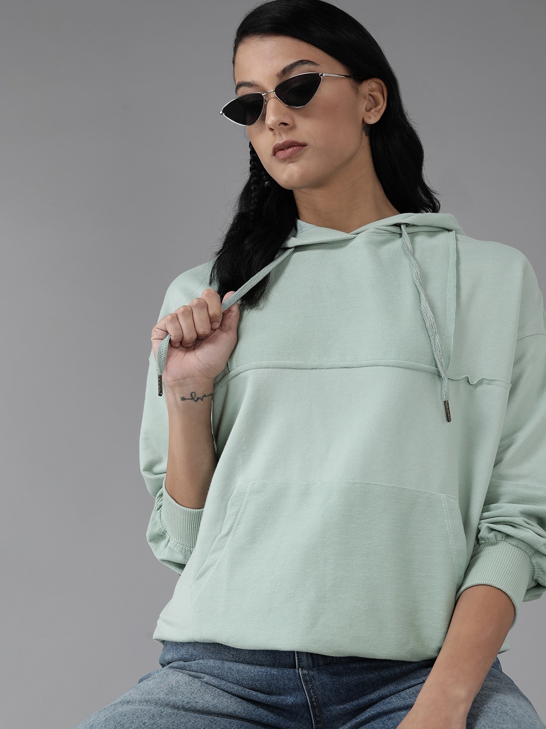 

Roadster Women Mint Green Solid Hooded Sweatshirt