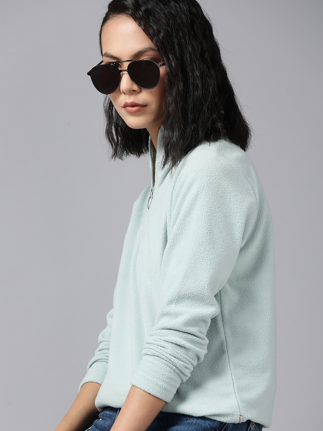 

Roadster Women Sea Green Solid Fleece Half Zipper Sweatshirt