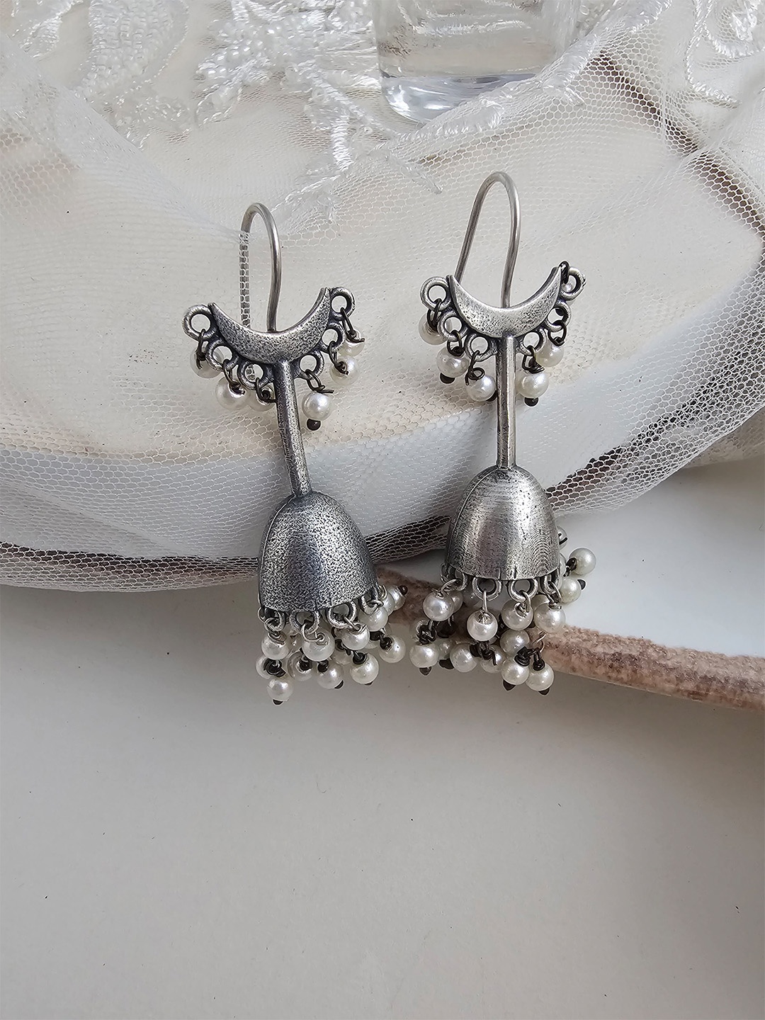

Binnis Wardrobe Silver-Toned Contemporary Jhumkas Earrings