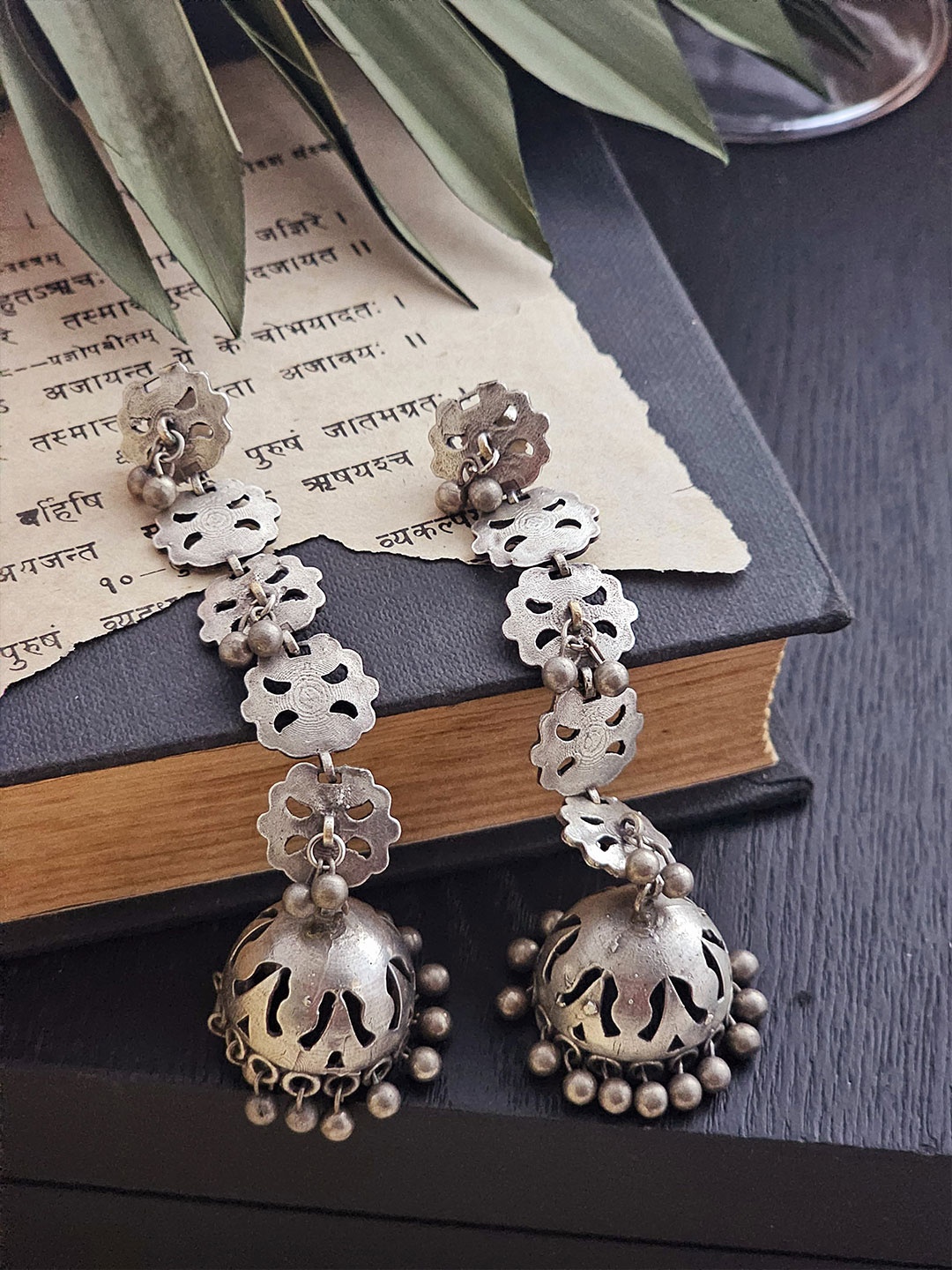 

Binnis Wardrobe Silver-Toned Contemporary Jhumkas Earrings