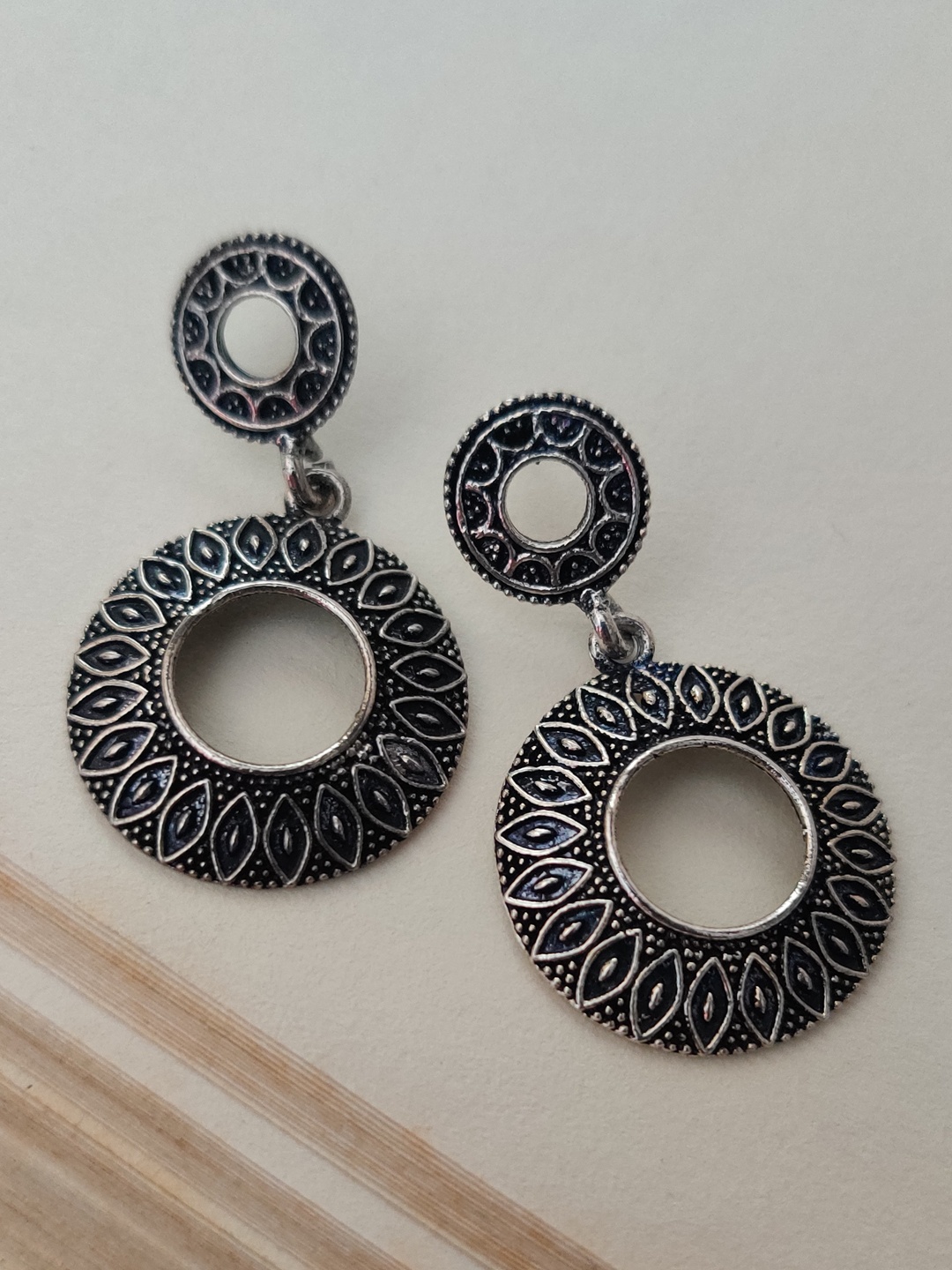

Binnis Wardrobe German Silver Silver Circular Drop Earrings